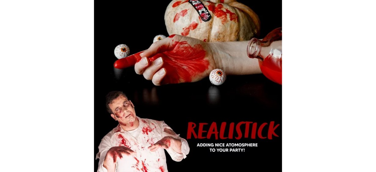 Person in zombie costume wearing Halloween makeup 