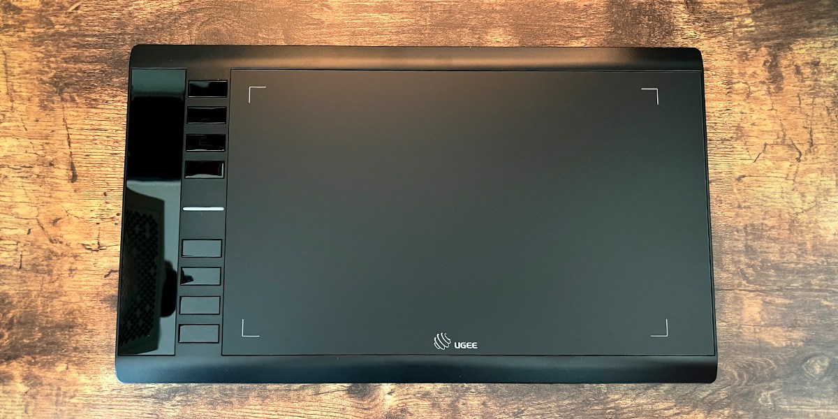 UGEE Graphics Drawing Tablet on wooden background